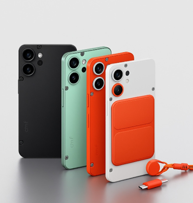 Eine Reihe farbiger Smartphones, die in einer sauberen Studioumgebung nebeneinander aufgestellt sind.